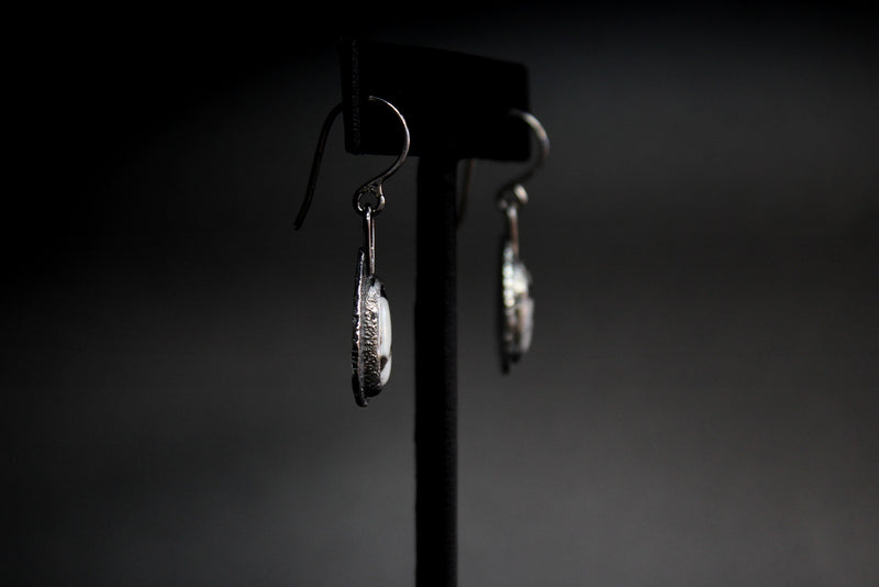 white buffalo teardrop dangle earrings